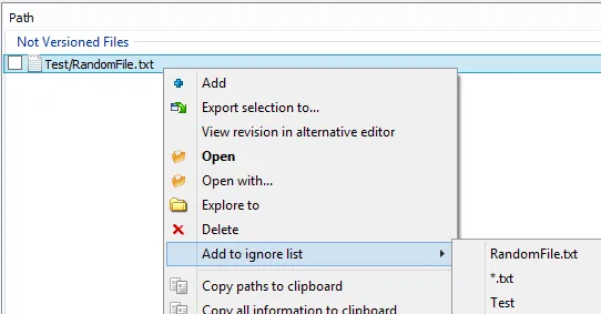 Adding file exclusions to .gitignore during commit