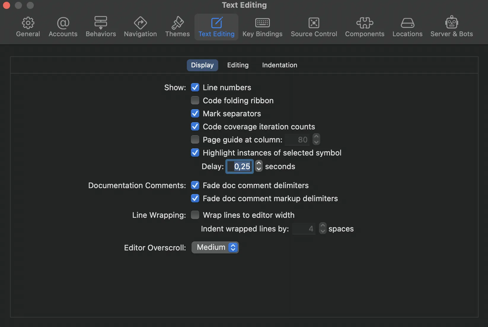 Xcode -> Preferences... -> Text Editing -> Display -> Line Wrapping
